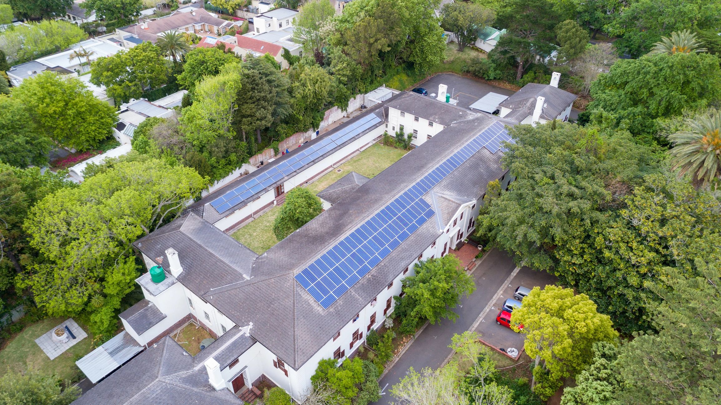Aerial rooftop solar array used as a hero image for solar design services